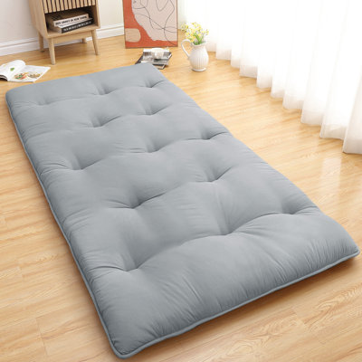 Matelas de sol futon japonais portable et confortable - lit de couchage pliable en forme de tatami, idéal pour une chambre, un dortoir, une chambre d'amis, un VR ou le camping. Disponible en formats simple et double.