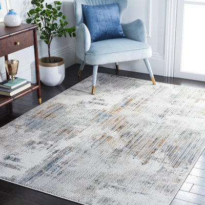 Cesara Abstract Grey/Gold Area Rug
