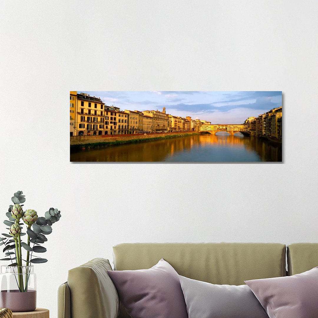 Riverfront Architecture And Ponte Vecchio, Arno River, Florence, Tuscany, Italy by Panoramic Images - Wrapped Canvas Panoramic Print