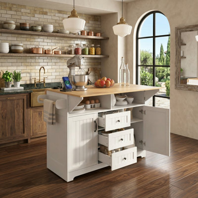Ce chariot de cuisine blanc et portable comprend un plateau de table pliable, une prise de courant, un support à épices et un porte-serviettes pratique et esthétique.