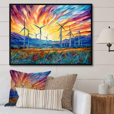 Éoliennes au lever du soleil