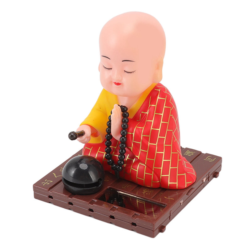 Figurine bouddhiste moine en plastique à énergie solaire