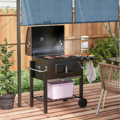 Barbecue au charbon de bois, barbecue portable de camping et de pique-nique extérieur. Spacieux 21,75 po x 16,5 po, table d'appoint, tablette de rangement, roulettes, poignée, noir. Crochets à outils pratiques pour un accès facile à la cour arrière