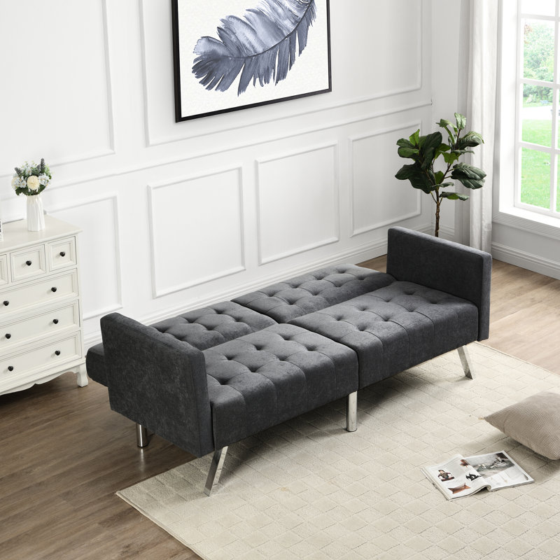 Canapé-lit gris foncé avec couchage réglable et confortable, facile à monter.