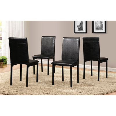4 chaises de salle à manger noires avec sièges rembourrés en similicuir et base en métal, de 4 - assises sur bases