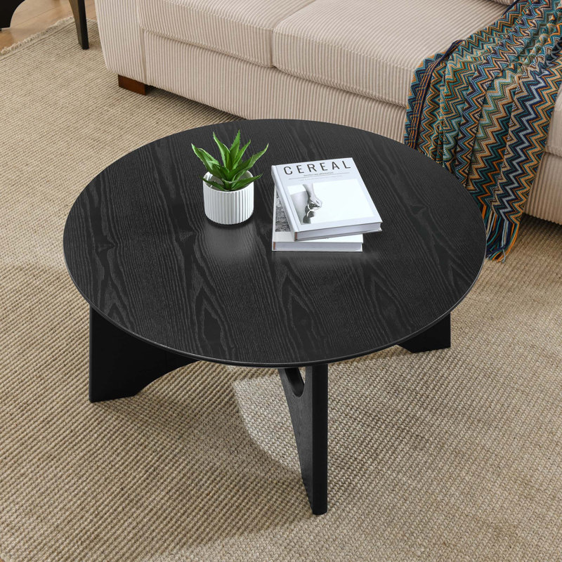 Table basse ronde en bois avec une fabrication robuste et une conception classique pour le décor du salon et l'utilisation quotidienne