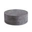 Table basse ronde avec finition en faux béton