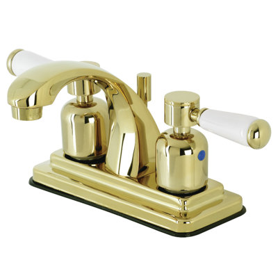 Kingston Brass Paris Two-Handle 3-Hole Deck Mount 4" Centerset Bathroom Faucet with Plastic Pop-Up