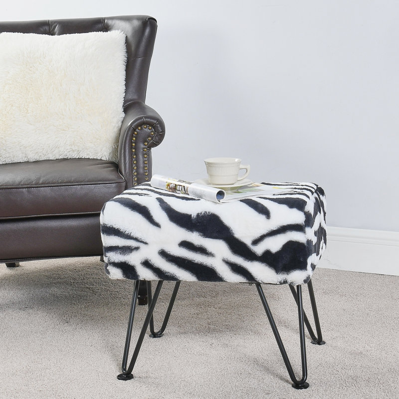 Upholstered Ottoman, Black/White Faux Fur