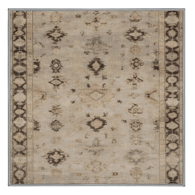 Tapis gris lavable à la machine