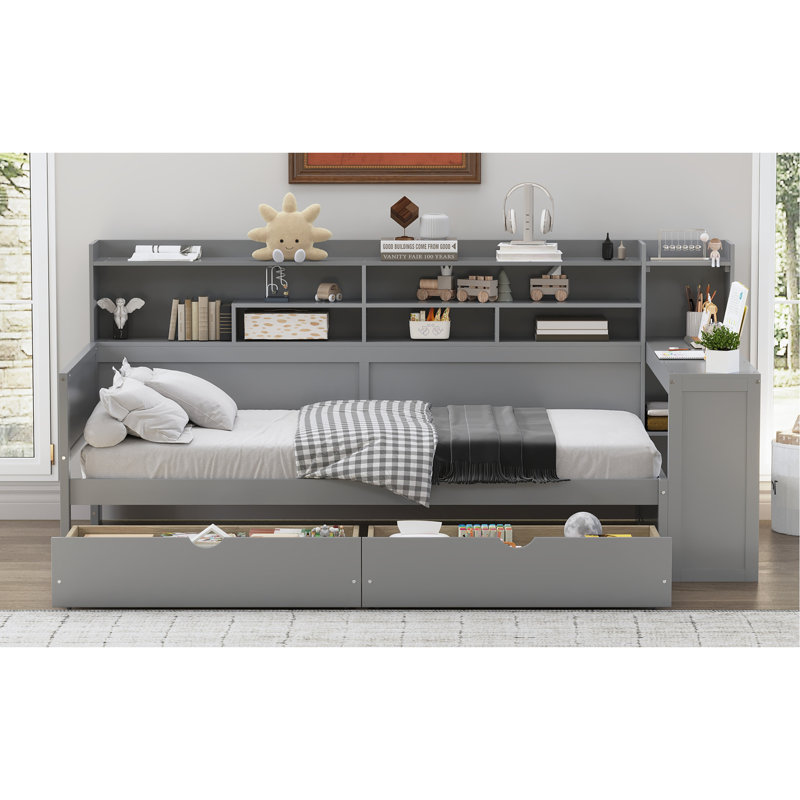 Lit de jour simple en bois gris avec tablettes de rangement, deux tiroirs et un bureau d'étude pour maximiser la commodité de la chambre à coucher