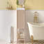 Petit meuble-lavabo simple 20 po avec lavabo en céramique et porte ouverte