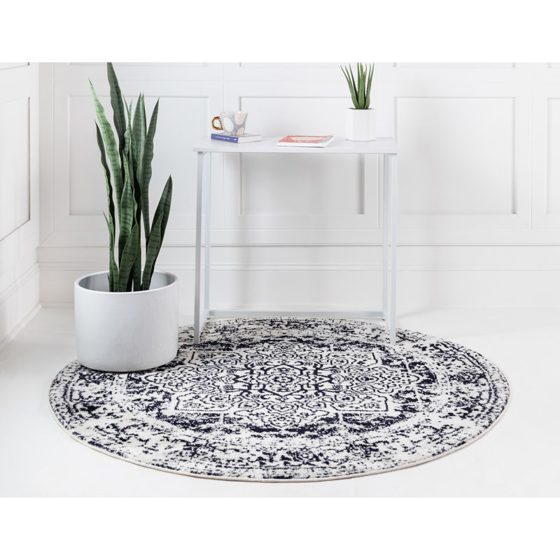Tapis bleu Malynn, Rond 7 pi 10 po