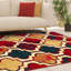 Tapis rouge quadrilobé 5 pi x 8 pi tissé à la machine
