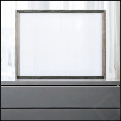 Le miroir Jehoram au fini gris, au design moderne et intemporel, rehausse la lumière et l'espace dans n'importe quelle pièce