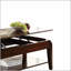 Table basse en noyer avec plateau relevable pour un rangement supplémentaire et une esthétique moderne, parfaite pour organiser et décorer votre salon.