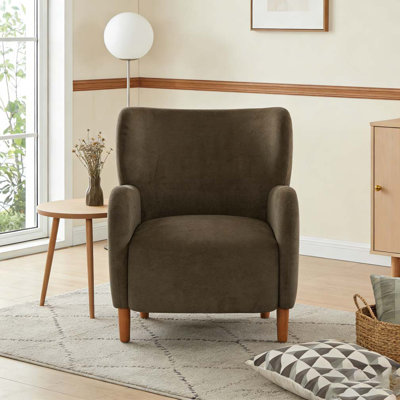 Fauteuil club rembourré à oreilles