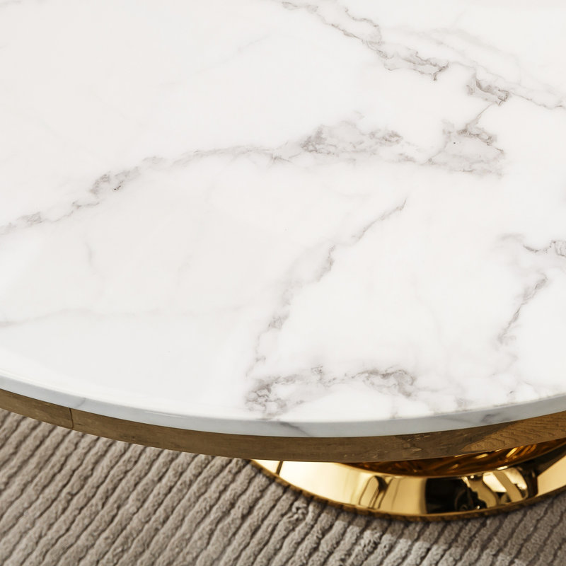 Table de salle à manger ronde avec une texture de marbre exquise, une base en acier inoxydable de 400 livres et une table de fête