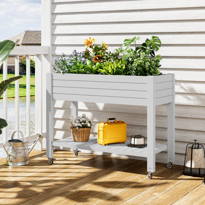 Lit de jardin surélevé - jardinière surélevée pour l'extérieur avec résine résistante aux intempéries, tablette et 4 roues pivotantes