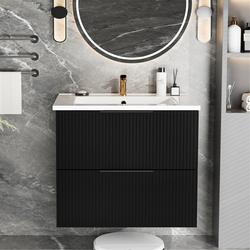 Meuble-lavabo suspendu noir moderne de 61 cm (24 pouces) avec lavabo en céramique et tiroir en forme de U, grand espace de rangement pour les produits de soins personnels. Tiroirs cannelés pour une durabilité accrue et une ouverture/fermeture fluide.