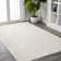 Asala Solid Low-Pile Beige Rug