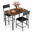Ensemble de table de salle à manger 3 pièces industriel, table rectangulaire rustique en grain de bois rétro avec 2 chaises rembourrées en polyuréthane noir, mobilier de coin-repas en métal compact pour petit appartement