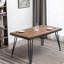 Ensemble de salle à manger 7 pièces avec table à épingle et chaises à dossier croisé Arroyo pour une expérience culinaire confortable et fonctionnelle