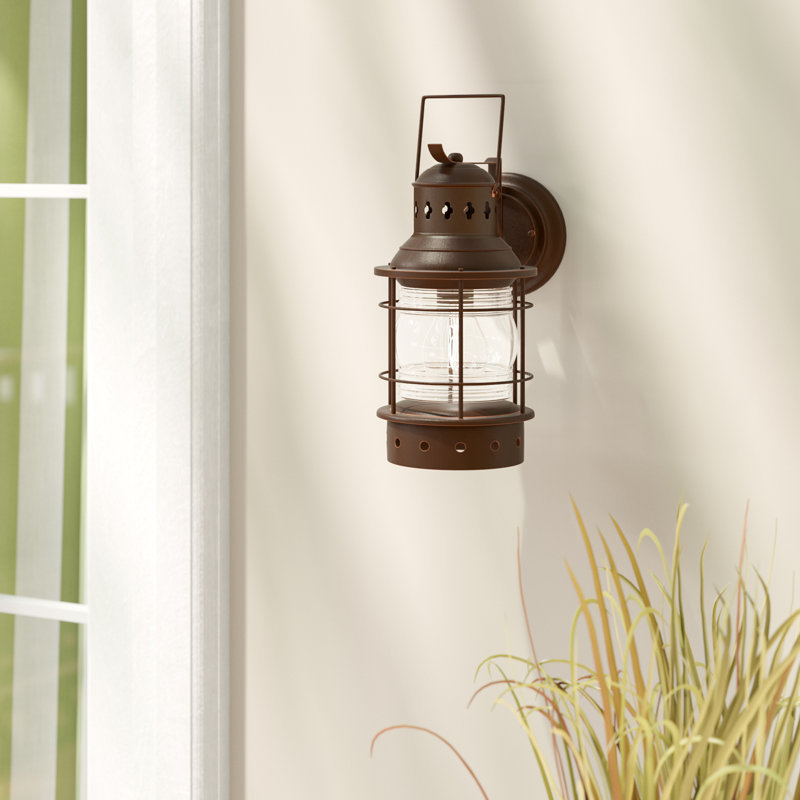 Crownsville 18 in. H 1-Light Burnished Bronze Coastal Outdoor Wall Sconce made of Durable Steel, Clear Ribbed Glass Shade, LED Compatible, Use for Exterior Porch Patio Front Door or Garage