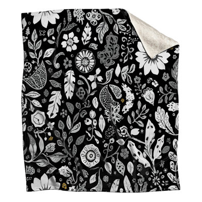 Couvertures noires à motif floral
