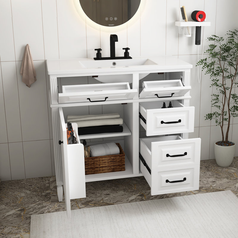Meuble-lavabo autoportant avec comptoir en céramique, structure en bois massif et armoire en panneau de fibres à densité moyenne, tiroir rabattable avec tablette réglable et poignées en métal (robinet non inclus), blanc