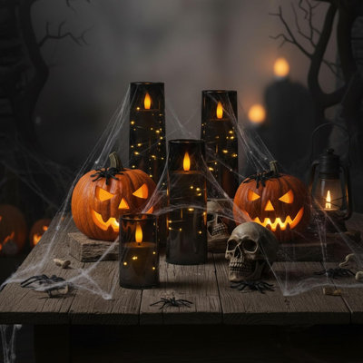 Ensemble de 8 bougies piliers DEL noires sans flamme avec télécommande et minuterie, fausses bougies en acrylique à effet scintillant, guirlande lumineuse étoilée intégrée, bougies sans flamme à piles pour Noël, Halloween, mariage, décoration intérieure, cadeau de fêtes