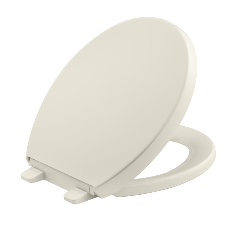 Reveal Quiet-Close with Grip-Tight Toilet Seat, Biscuit, Round