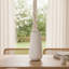 Vase ondulé texturé en céramique blanche