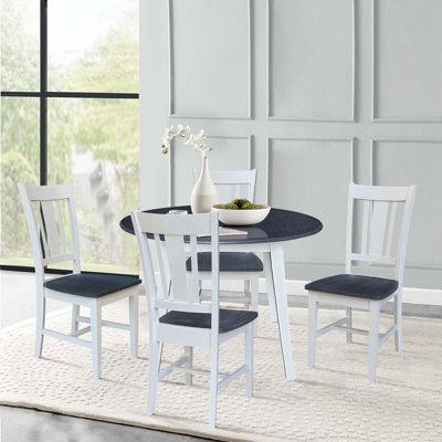 Daschle 4 - Person Drop Leaf Rubber Solid Woood Dining Set by Red Barrel Studio