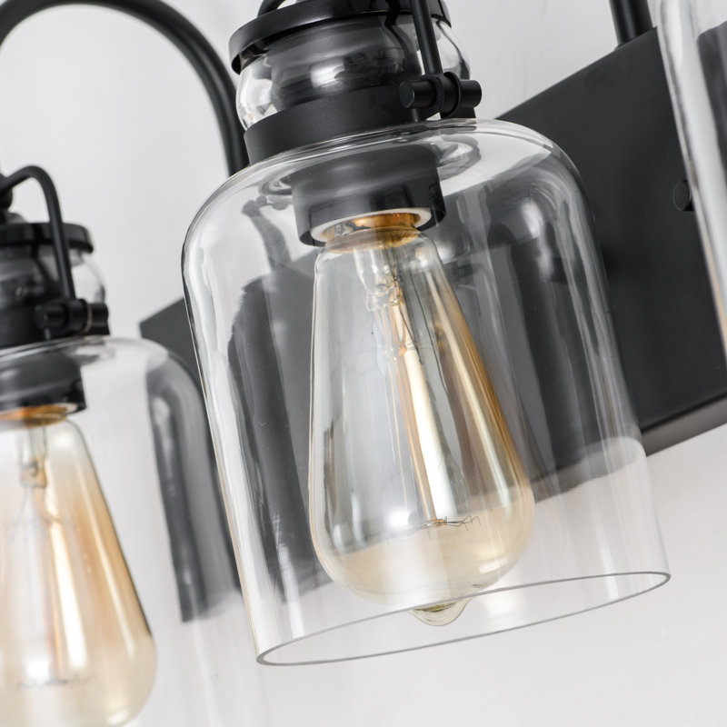 Éclairage pour salle de bain à intensité variable 3 lumières avec abat-jour en verre transparent Loucks, Noir mat