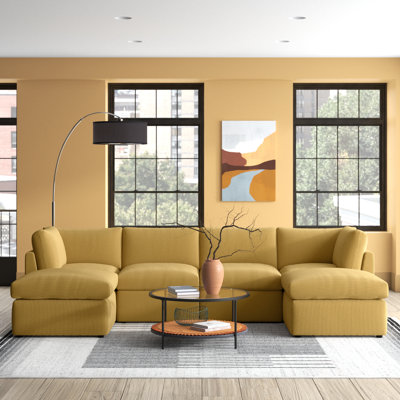 Annai 129" Wide Reversible Modular Corner Sectional with Ottoman