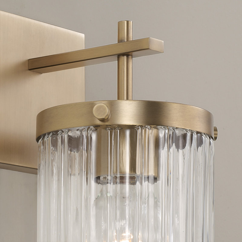 5.5" W x 10.75" H 1-Light Sconce with Clear Beveled Fluted Glass, Aged Brass