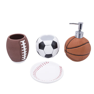 4-Piece Sports Bathroom Accessories Set Complete With Basketball Lotion/Soap Dispenser,Soccer Bath Cup/Tumbler,Base Ball Soap Dish,Football Toothbrush -  Trinx, 648FBE1A04E54245AFB62979C752609C