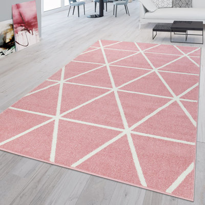 Tapis rose à motif géométrique Doyle