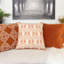 Coussin décoratif géométrique en coton brodé