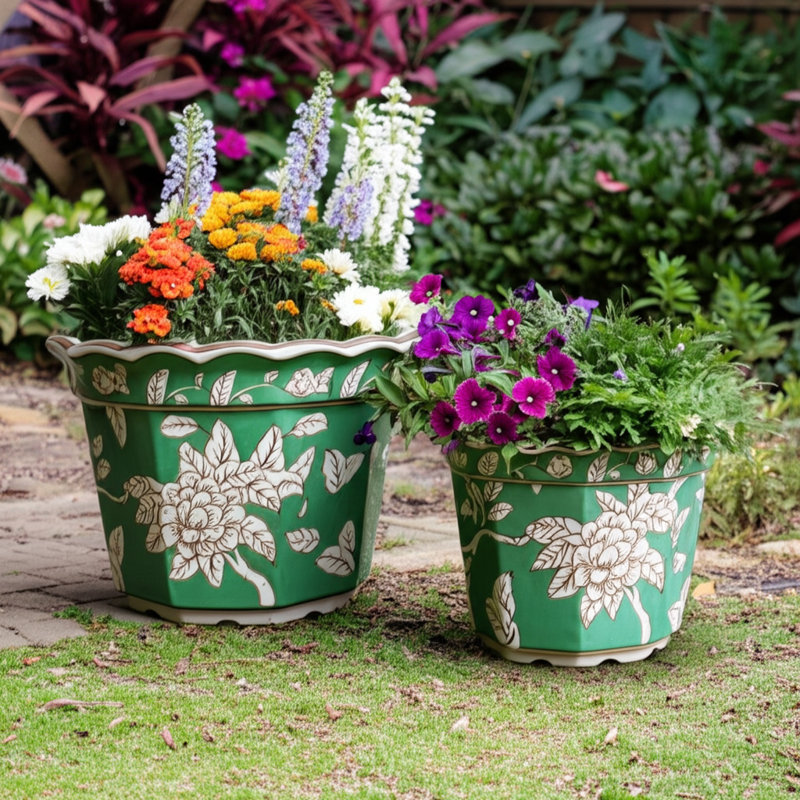 Set Of 2 Ceramic Planters With Embossed Floral Detailing And Scalloped Rims
