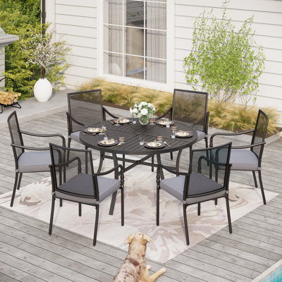 Ensemble repas pour 6 personnes avec table ronde et coussins Boule
