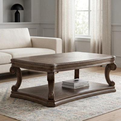Melicent 52 po Table basse rectangulaire en bois patiné avec tablette ouverte et pieds à volutes