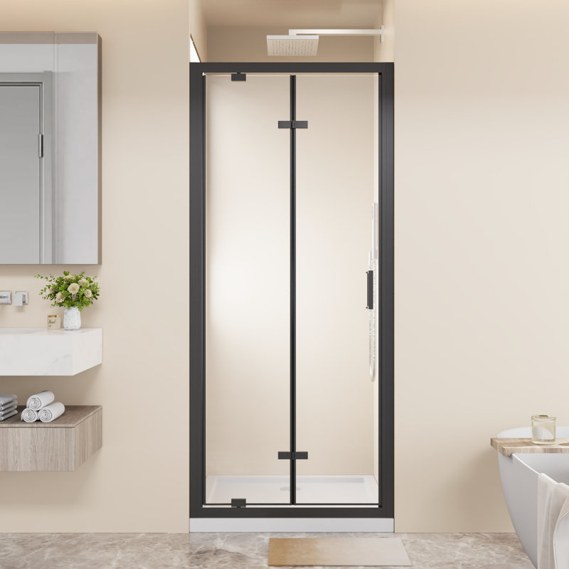 Porte de douche pivotante pliante avec cadre 32 po x 72 po peu encombrante, verre trempé transparent de 1/4 po avec poignée en acier inoxydable, installation réversible, noir