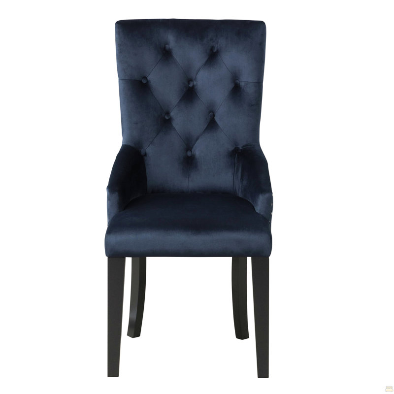 Fauteuil capitonné à dossier