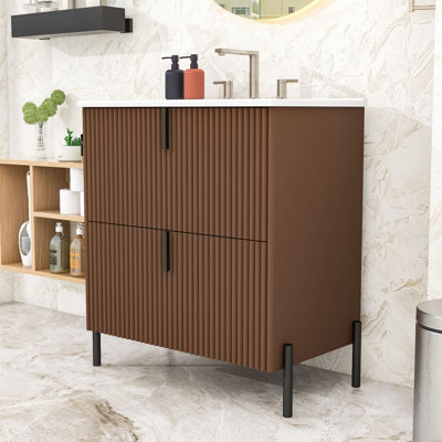 Meuble-lavabo autoportant moderne avec design cannelé, lavabo en céramique brillante et tiroirs à fermeture en douceur