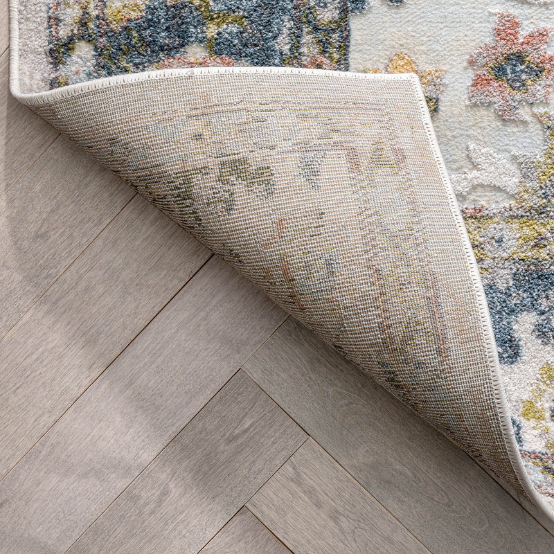 Ivory and Blue Synthetic Oriental Area Rug 5'3" x 7'3"