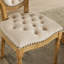 Élégante chaise de salle à manger rembourrée en velours beige avec pieds en velours et ressort en acier-492433504