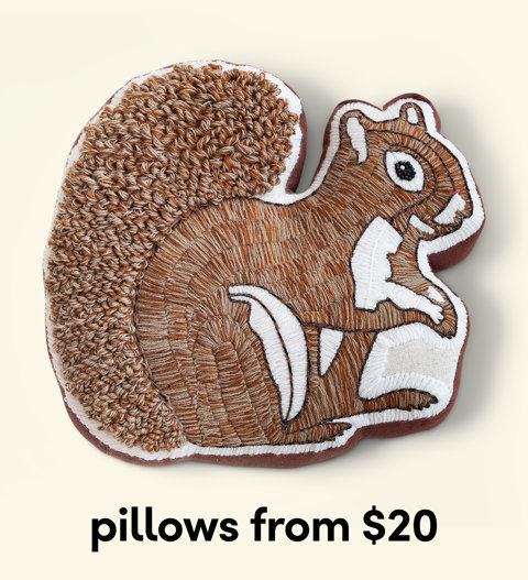 Squirrel-shaped decorative throw pillow with textured embroidery, pillows from $20.