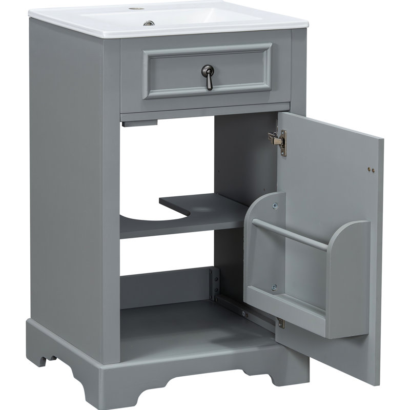 Meuble-lavabo de 20 pouces avec lavabo en céramique, porte à fermeture en douceur et poignée pour faciliter les petits travaux de rangement